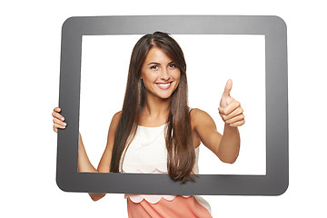 Image showing Woman looking through frame