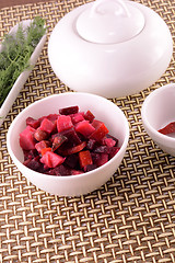 Image showing macro tasty venegret with parsley on a white plate