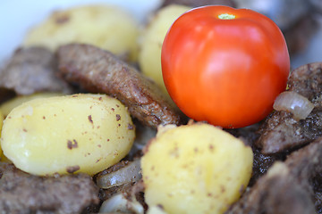 Image showing Fried pork liver with tomatoes and potatoes