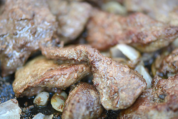 Image showing fresh ripe roasted beef meat with onion