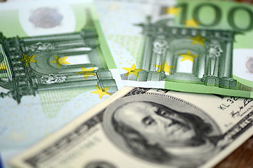 Image showing packs of dollars and euro money