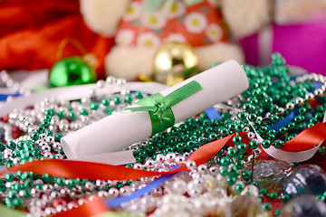 Image showing christmas ornament with pearls and white paper, new year card