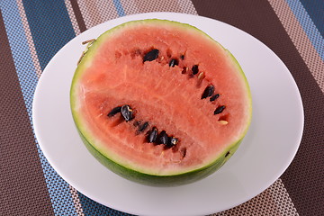 Image showing Watermelon fruit sliced pieces on the white plate