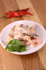 Image showing Healthy salad with fresh vegetables on wooden background