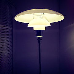Image showing Stylish lamp in a dark room