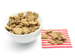 Image showing Selfmade dog cookies in a bowl of chinaware