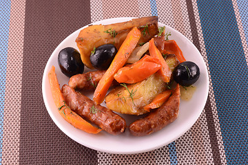 Image showing fresh salad with olives sausage carrot