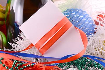 Image showing Christmas background with wine bottle pearls and empty paper note