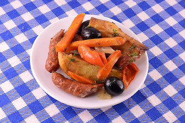 Image showing fresh salad with olives sausage carrot