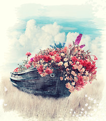 Image showing Old Boat With Flowers