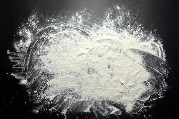 Image showing White flour on black background