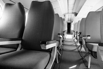 Image showing Interior of an airplane with many seats