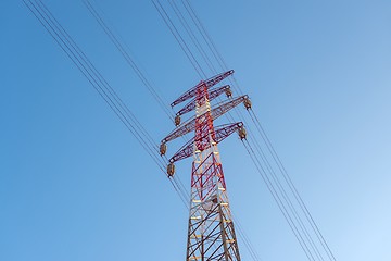 Image showing Large transmission towers at sunset