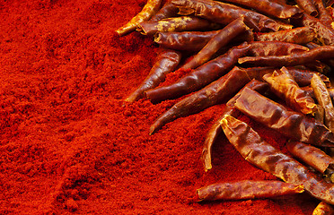 Image showing Red chili peppers and chili powder