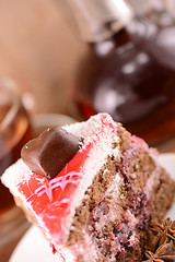 Image showing Cake with chocolate heart and glass carafe