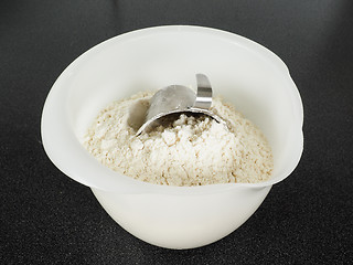 Image showing Measurement tool in a bowl of wheat flour