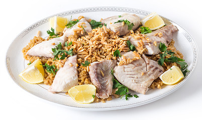 Image showing Lebanese fish rice and nuts serving dish