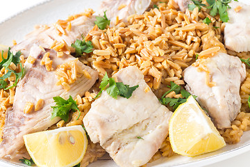 Image showing Lebanese fish rice and nuts closeup