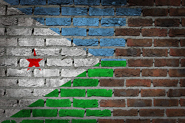 Image showing Brick wall texture with flag