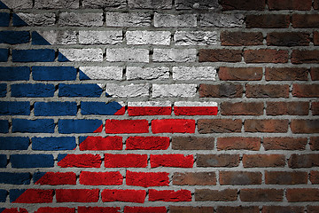 Image showing Brick wall texture with flag