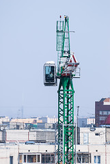 Image showing Construction crane over city background