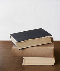 Image showing stack of books on the table