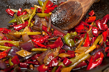 Image showing fried chili pepper and vegetable on a wok pan