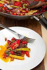 Image showing fried chili pepper and vegetable on a wok pan