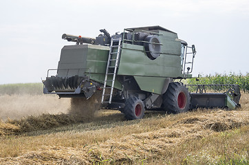 Image showing Working combine harvester