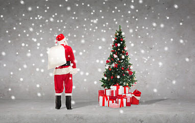 Image showing man in costume of santa claus with bag