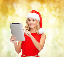 Image showing woman in santa helper hat with tablet pc