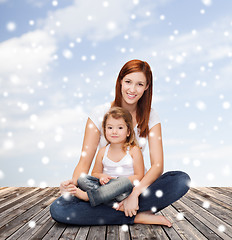 Image showing happy mother with little girl