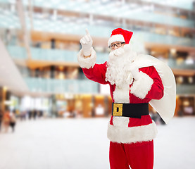 Image showing man in costume of santa claus with bag