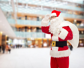 Image showing man in costume of santa claus with bag