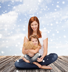 Image showing happy mother with little girl and teddy bear