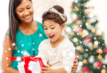 Image showing happy mother and child girl with gift box