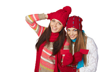 Image showing Two winter girls showing blank cards