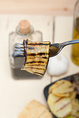 Image showing grilled eggplant oubergine on a fork