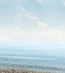 Image showing light wave on sea and clouds in sky