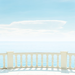 Image showing balcony over sea and light clouds in blue sky