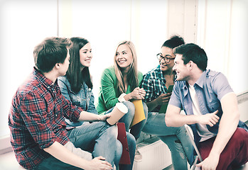 Image showing students communicating and laughing at school