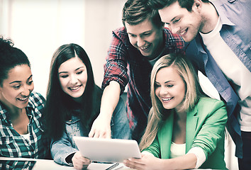 Image showing students looking at tablet pc in lecture at school