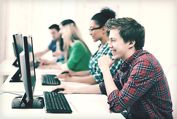 Image showing student with computer studying at school