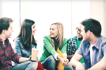 Image showing students communicating and laughing at school