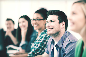 Image showing students with computers studying at school