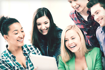 Image showing students looking at tablet pc in lecture at school