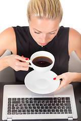 Image showing Business woman with cup of coffee.