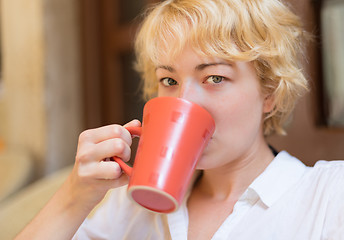 Image showing Lady With Cup of Coffee.