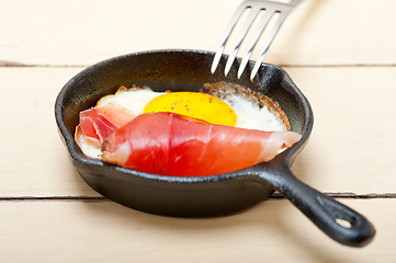 Image showing egg sunny side up with italian speck ham