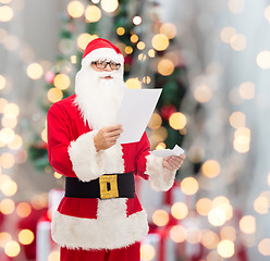 Image showing man in costume of santa claus with letter